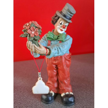 Clown liggend 22 cm hoog zwaar massief.